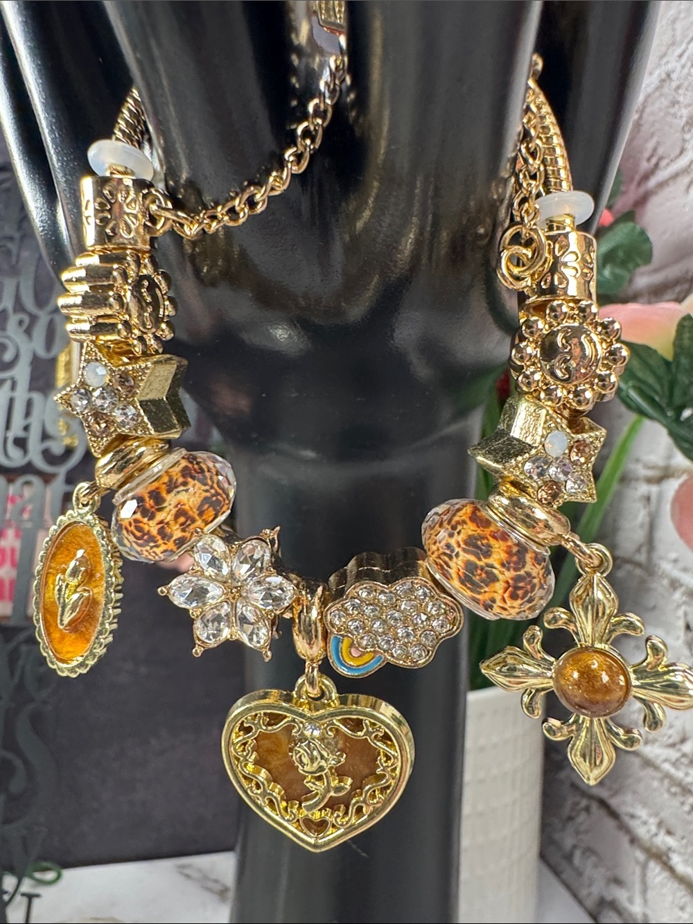 Gold-Plated Multi-Charm Statement Bracelet with Amber Accents
